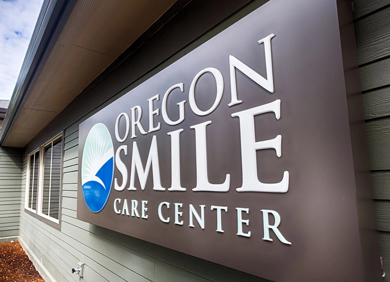 Oregon Smile Care Center building sign outside the dental office